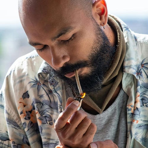 Man Lighting Cigarette