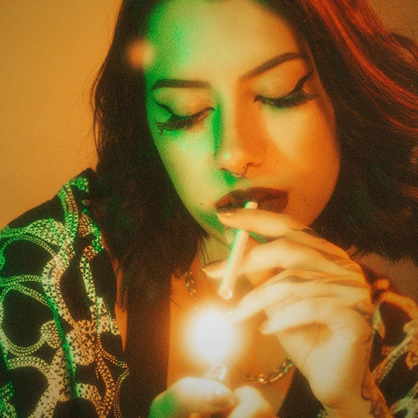 Woman Lighting Cigarette